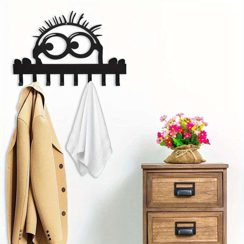 A single set of elegant wallmounted metal coat hooks with 8 hooks. Its a practical and stylish c