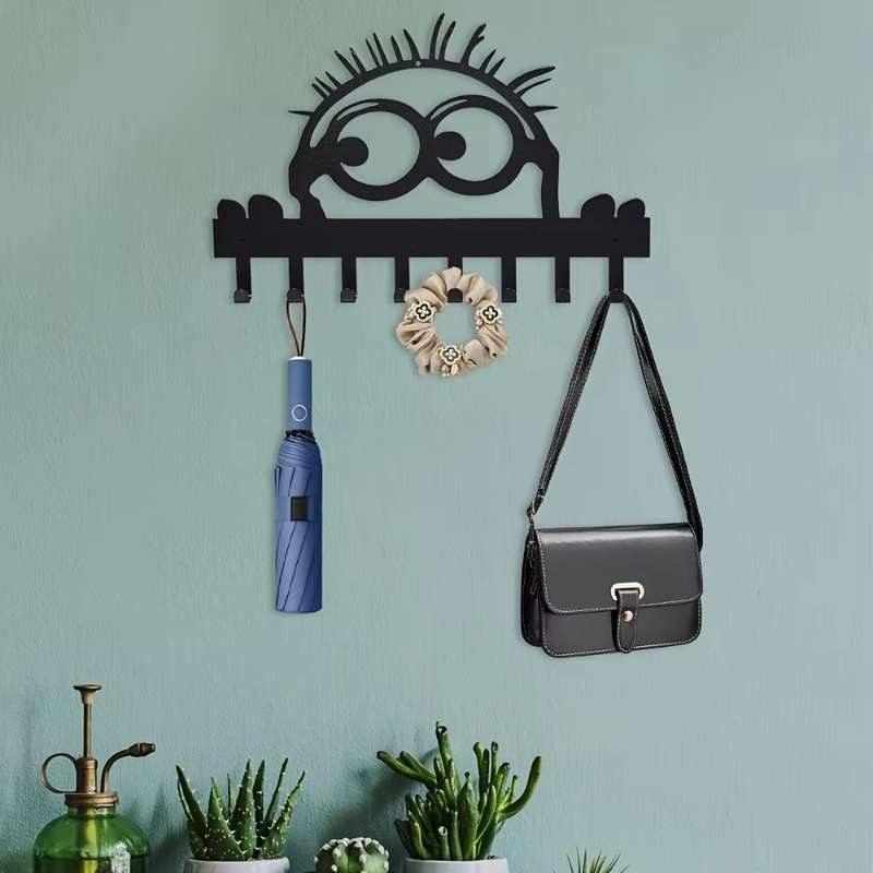 A single set of elegant wallmounted metal coat hooks with 8 hooks. Its a practical and stylish c