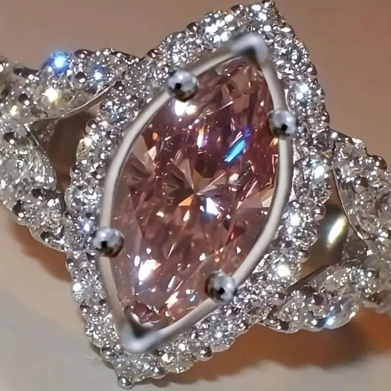 Four-Prong Eye Cut with Pink Synthetic Ring