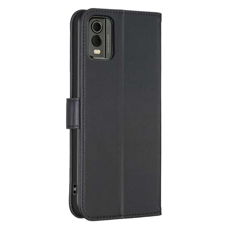 For Nokia C12 Four-leaf Embossed Leather Phone Case(Black)