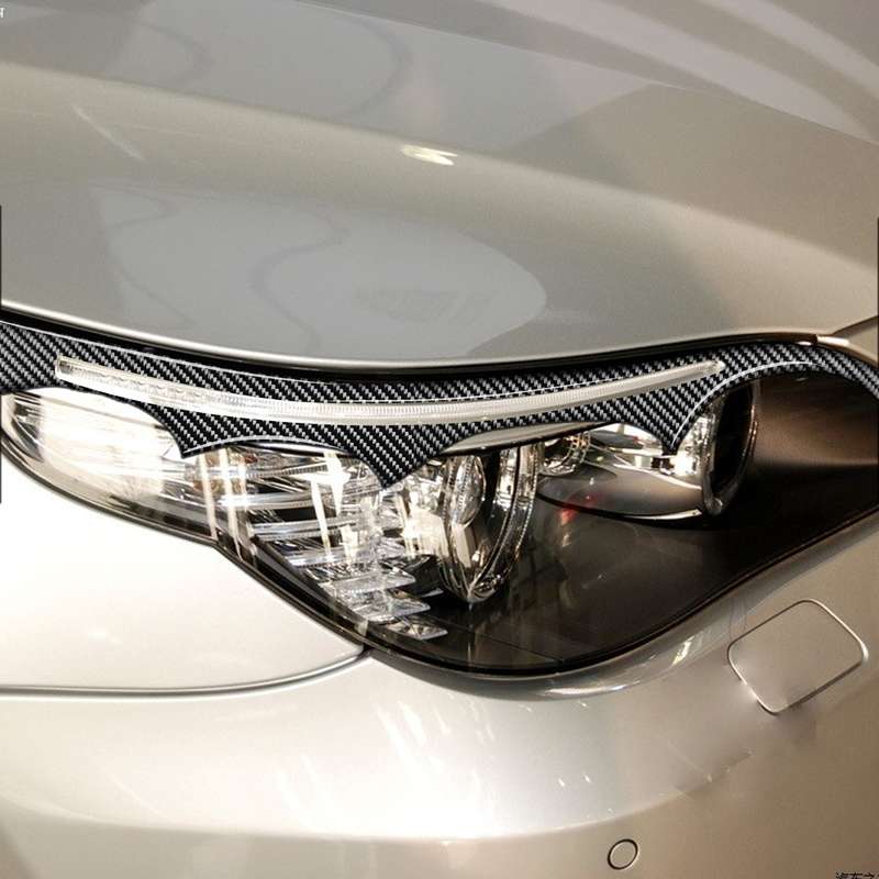 2 PCS / Set Carbon Fiber Car Lamp Eyebrow Decorative Sticker for BMW E60 5 Series 2004-2010, Drop Gl
