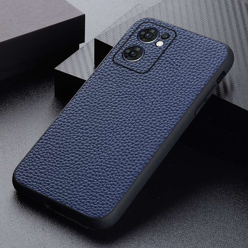 For OPPO Reno7 5G International Accurate Hole Two-color Litchi Texture PU Phone Case(Pink)