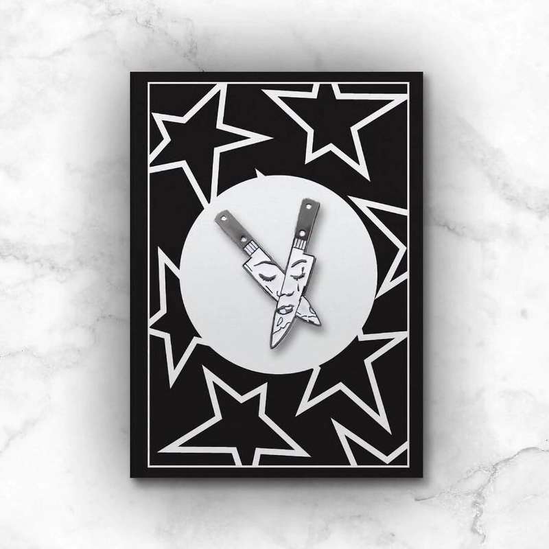 Face in a Knife Enamel Pin