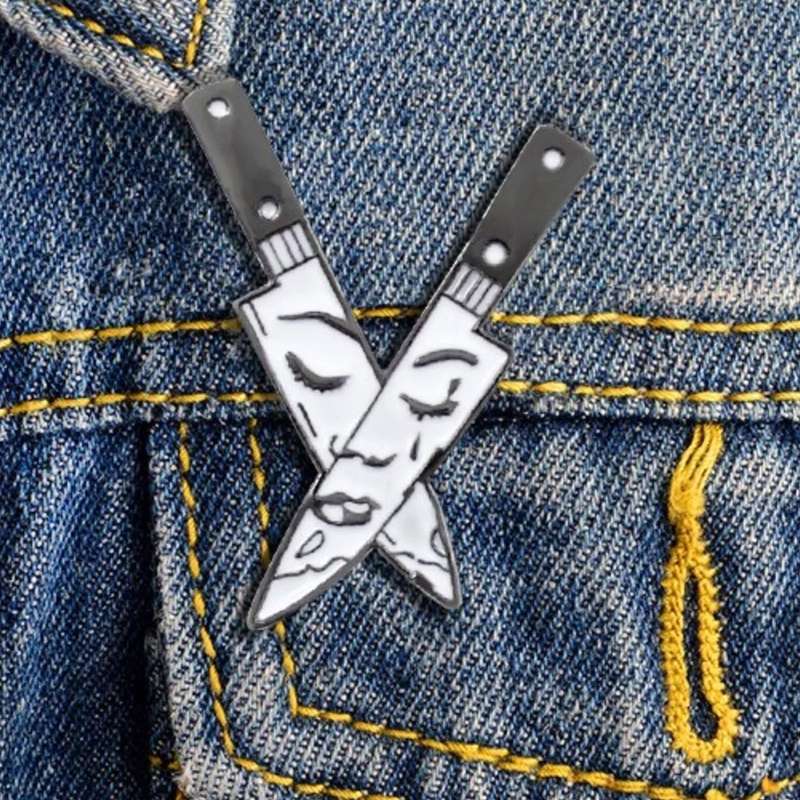 Face in a Knife Enamel Pin