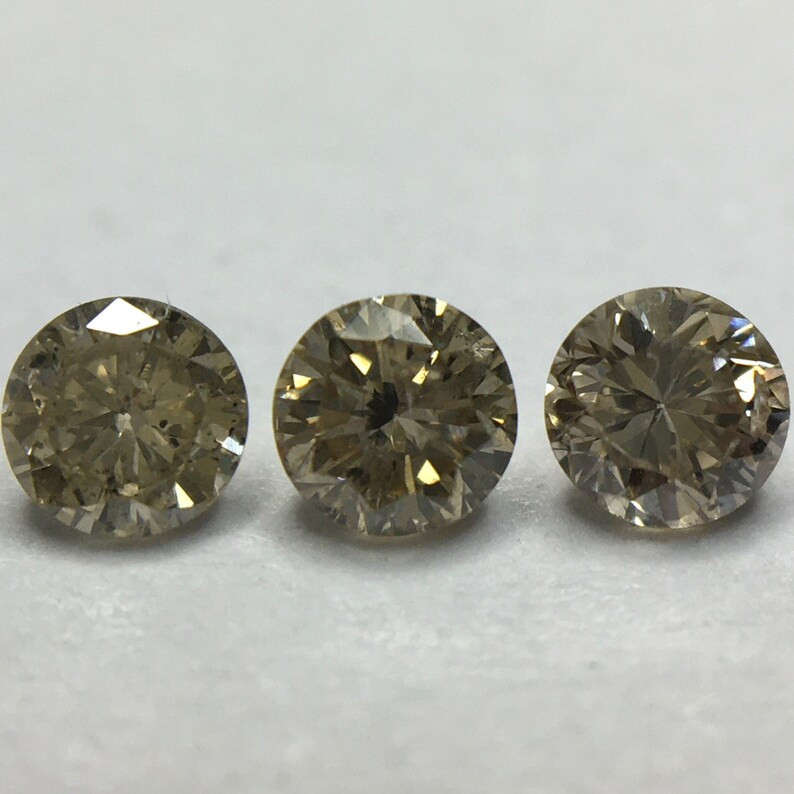 0.165 Ct 3 x Fancy Yellowish Brown Si1 - I1 Round Brilliant Melee Diamonds