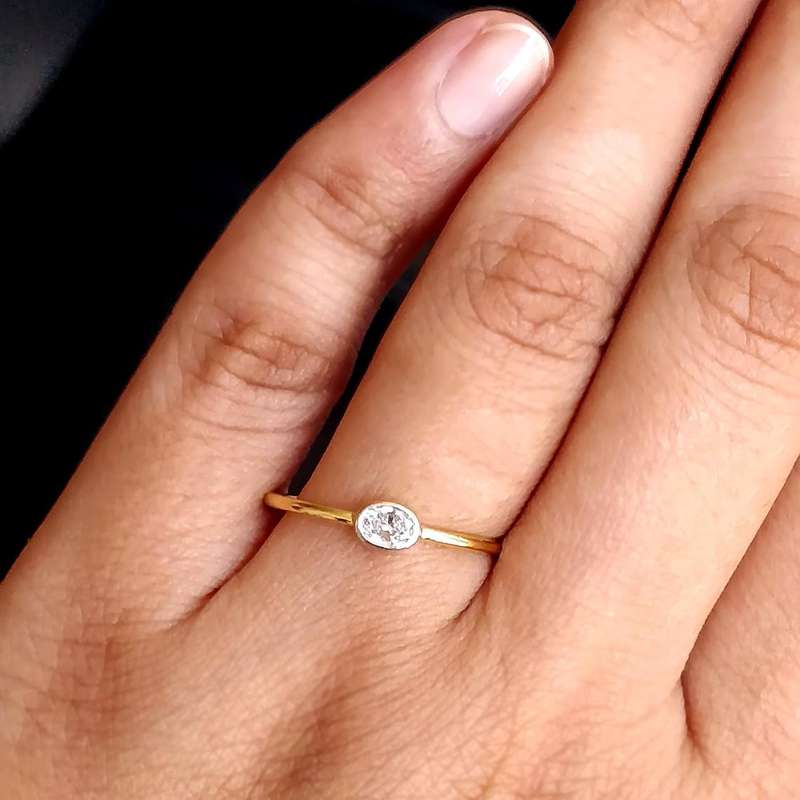 Dainty Oval Bezel Moissanite Ring