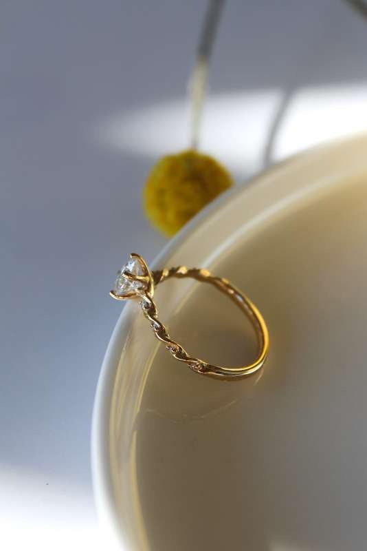 Moissanite Solitaire Twist Engagement Ring