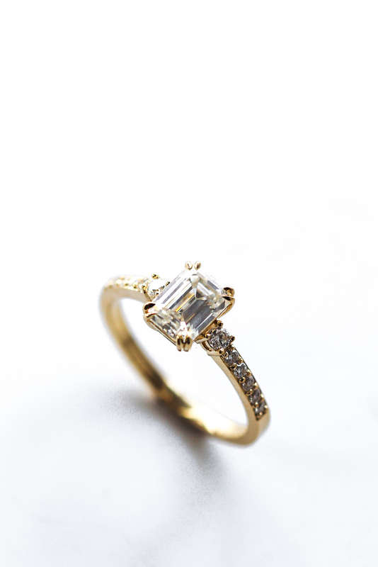 Emerald Moissanite Pavé Trilogy Engagement Ring