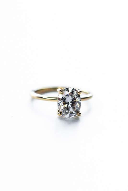 Oval Moissanite Hidden Halo Engagement Ring