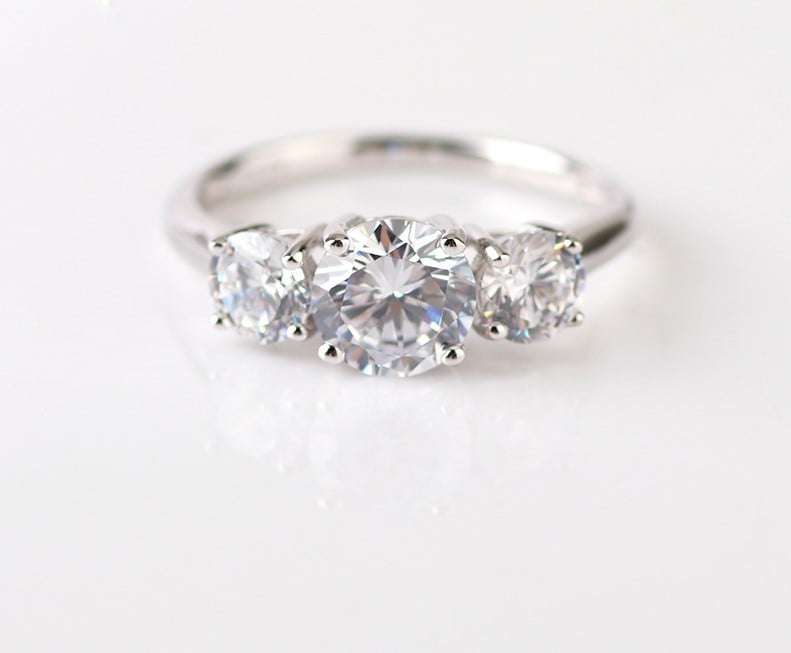 Trilogy Moissanite Engagement Ring