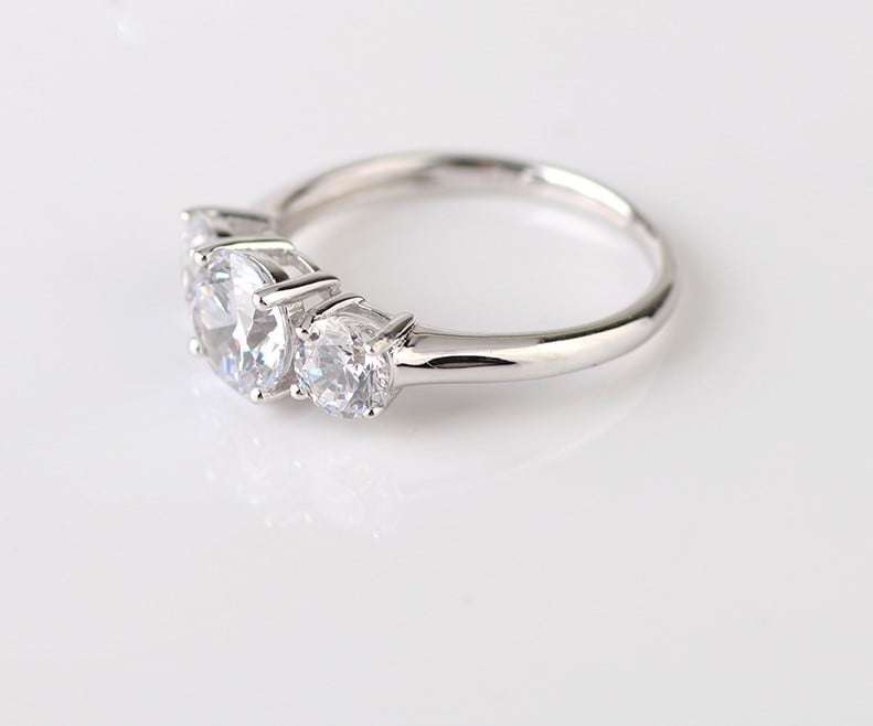 Trilogy Moissanite Engagement Ring