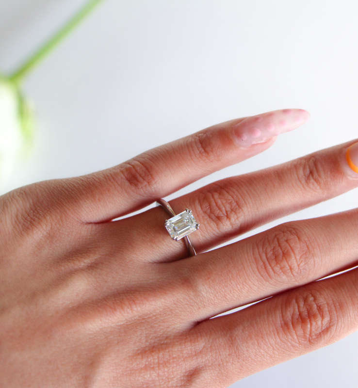 Double Claw Emerald Moissanite Engagement Ring