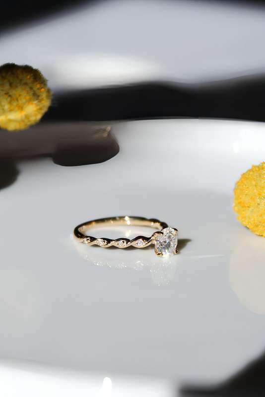 Moissanite Solitaire Twist Engagement Ring