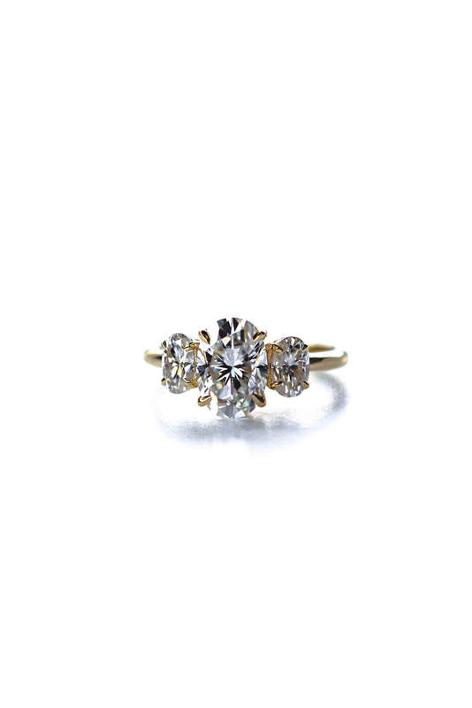 Oval Moissanite Trilogy Engagement Ring