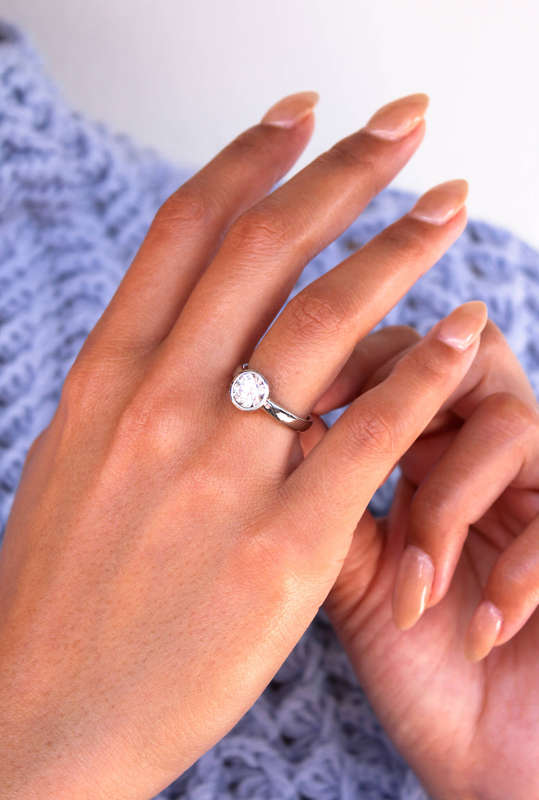 The Platinum Bezel Moissanite Ring