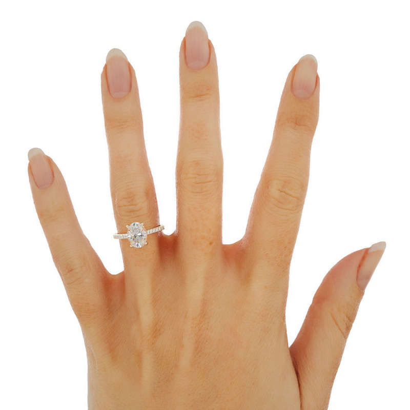 2ct Oval Moissanite Side Stone Engagement Ring