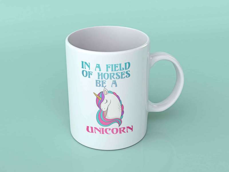 In a field of horses be a unicorn coffee mug