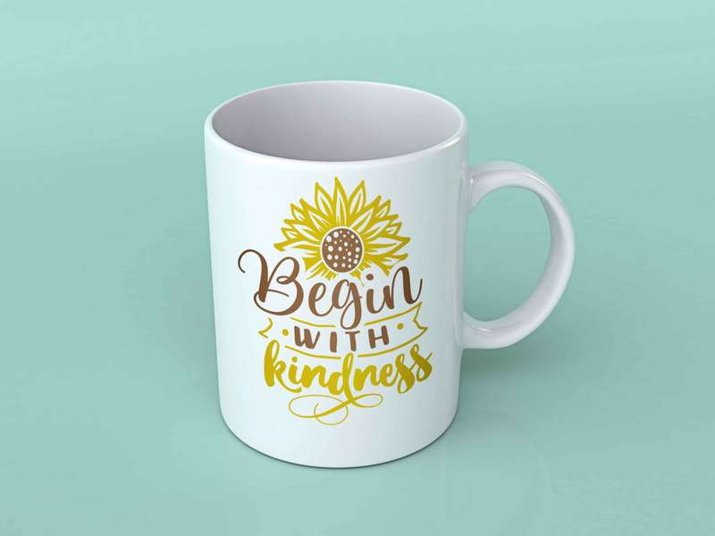 Begin with kindness sunflower coffee mug