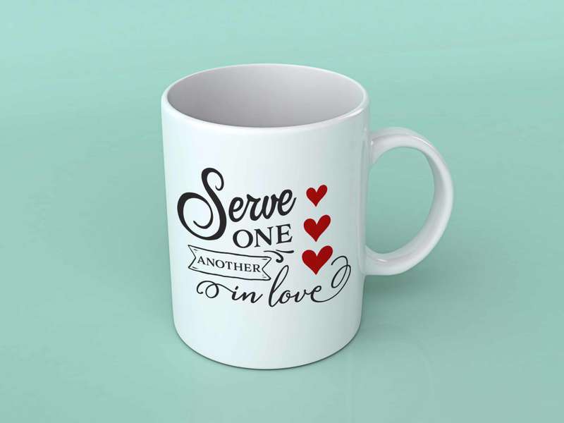 Serve one another in love coffee mug