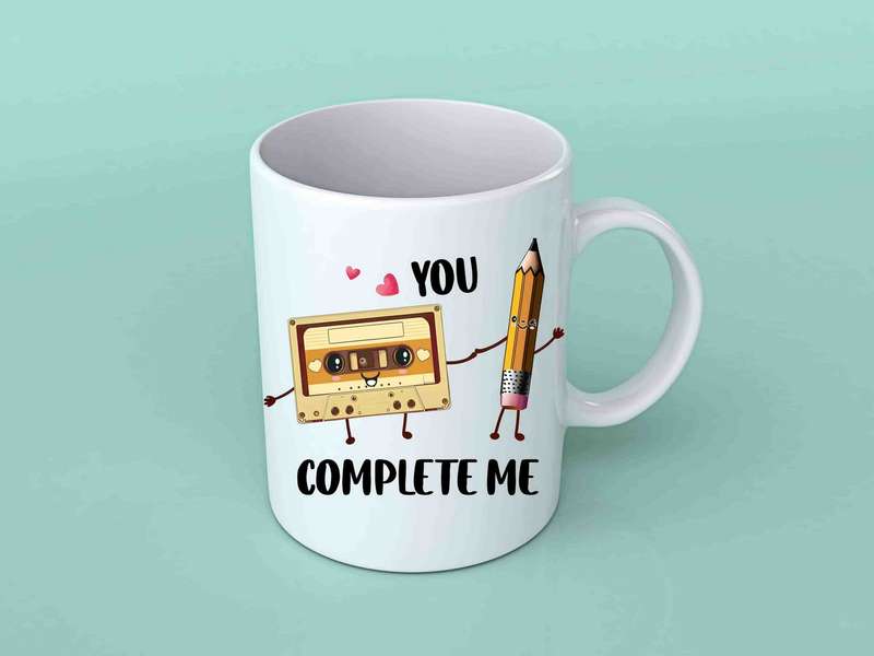 You complete me cassette and pencil coffee mug