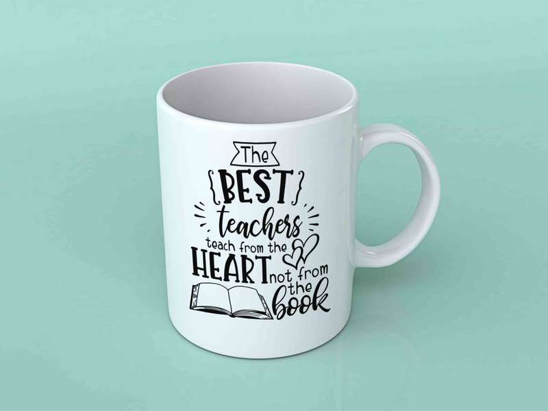 The best teachers teach from the heart coffee mug
