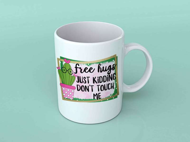 Free hugs just kidding coffee mug