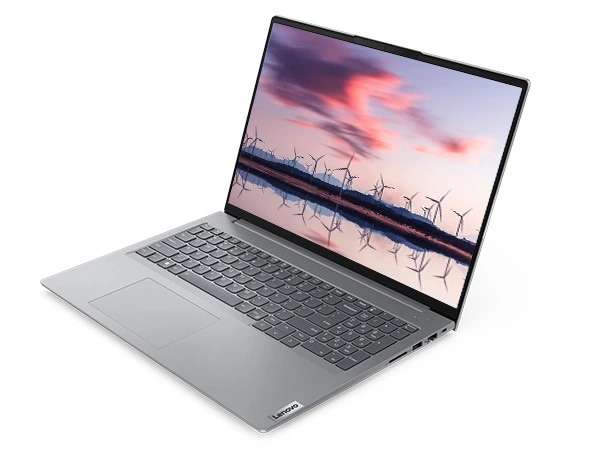 Wind turbines against a gorgeous sunset on the 14 inch display of the Lenovo ThinkBook 16 Gen 6 laptop.