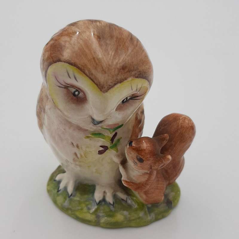 Beswick" Owl Standing with Squirrel Figurine