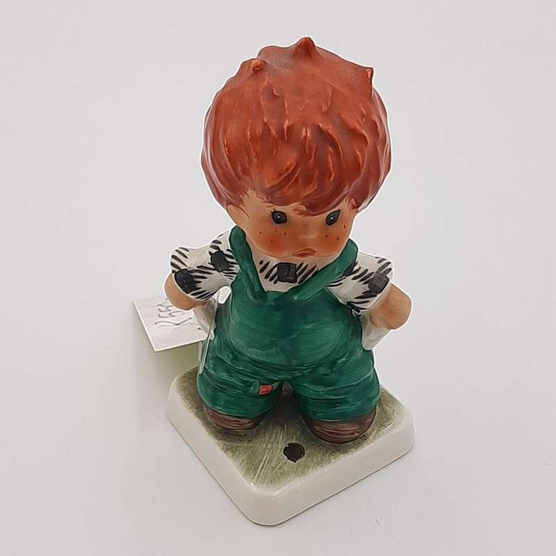 "W. Goebel" Boy in Green Dangureen Pulling Out His Pockets Hummel Figurine