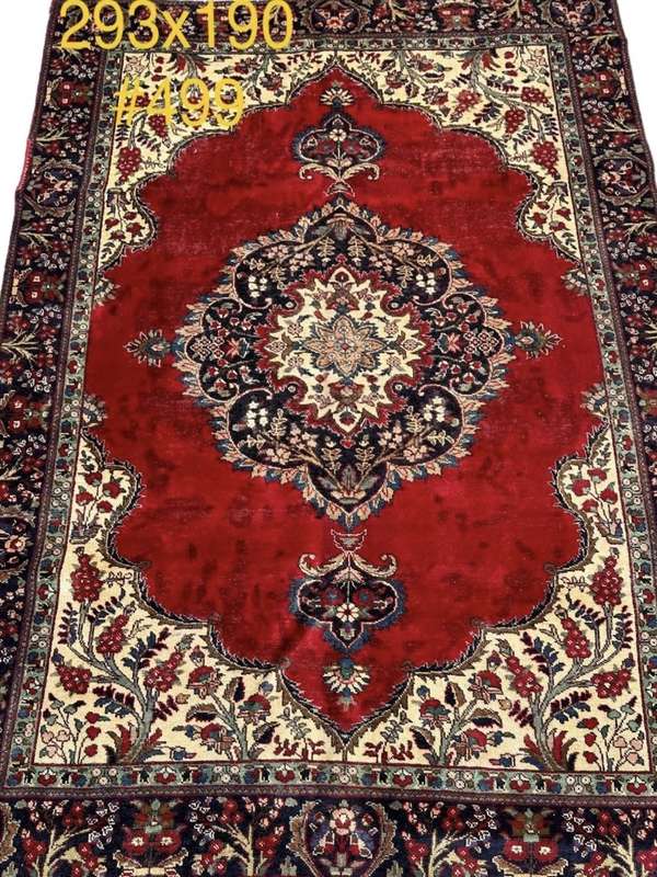 Further Reduction: Classic Persian Kashan Rug