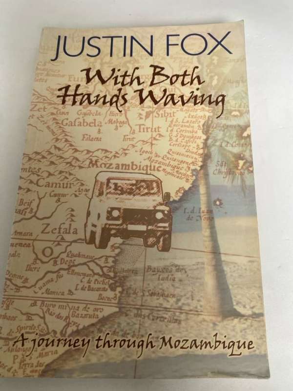 With both hands waving, a journey through Mozambique - Justin Fox