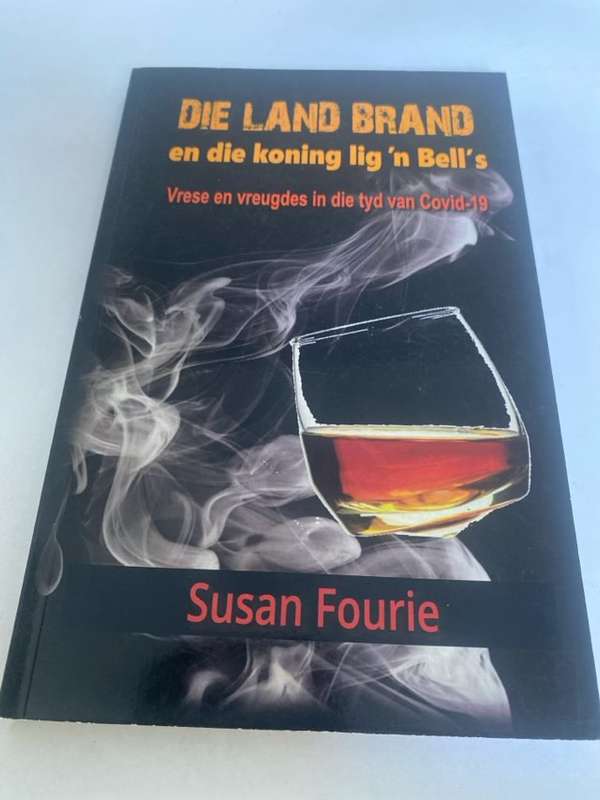Die land brand en die koning lig 'n Bell's - Susan Fourie
