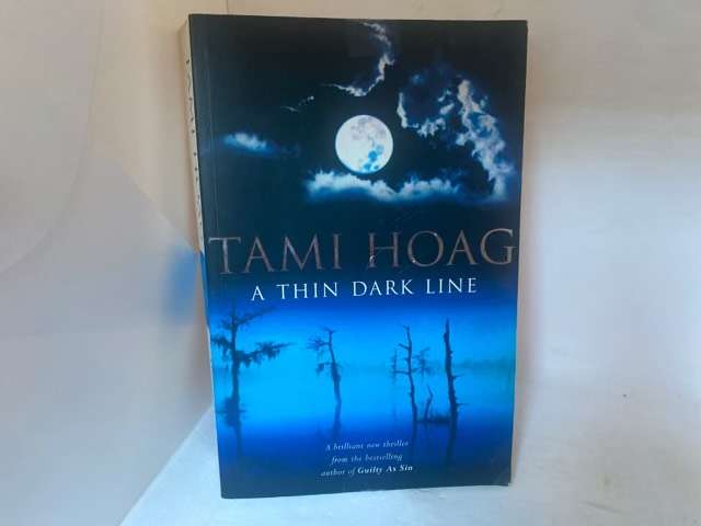 A Thin Dark Line - Tami Hoag