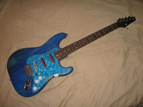 S/S/S Light Blue Pearl 3ply Strat Style Pickguard