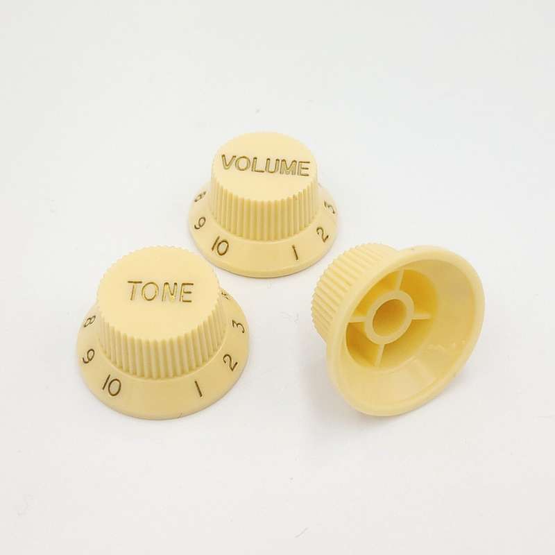 Ivory with Gold Writing Strat style replacement knob set - 1 Volume, 2 tone