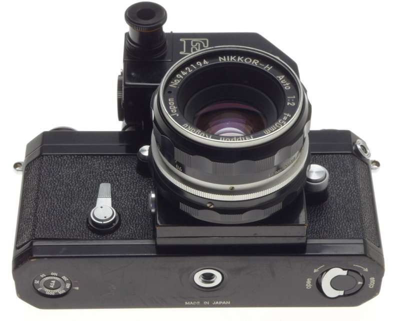 Black paint nikon f 35mm film slr camera photomic meter nikkor-h 1:2 f=50mm kogaku lens