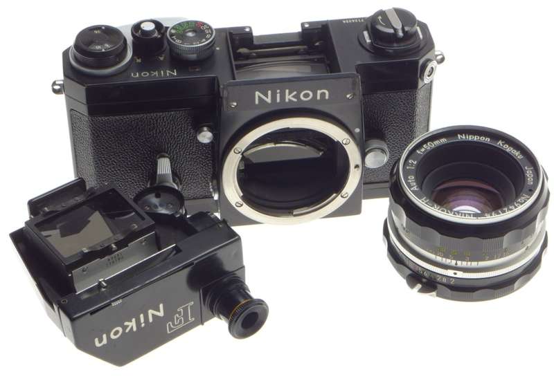 Black paint nikon f 35mm film slr camera photomic meter nikkor-h 1:2 f=50mm kogaku lens