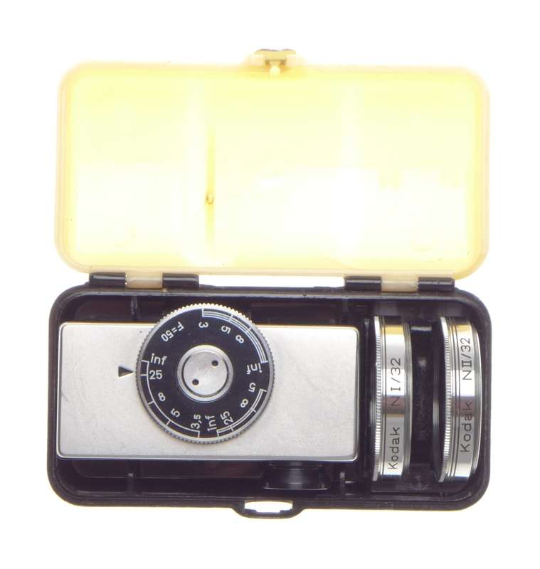 Cased Kodak universal hot shoe camera rangefinder with lenses