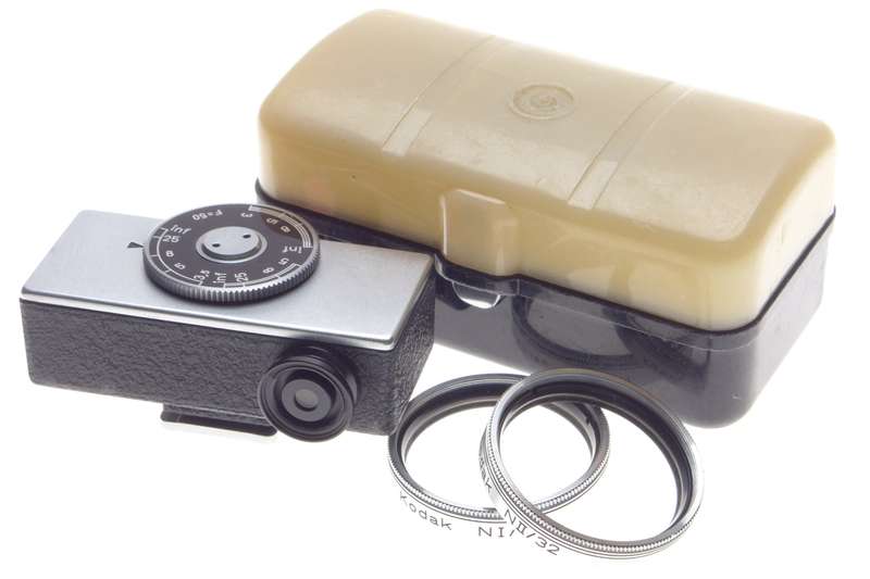 Cased Kodak universal hot shoe camera rangefinder with lenses