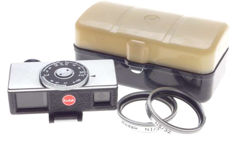 Cased Kodak universal hot shoe camera rangefinder with lenses