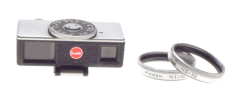 Cased Kodak universal hot shoe camera rangefinder with lenses