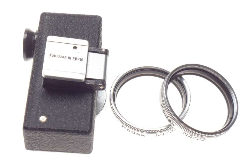 Cased Kodak universal hot shoe camera rangefinder with lenses