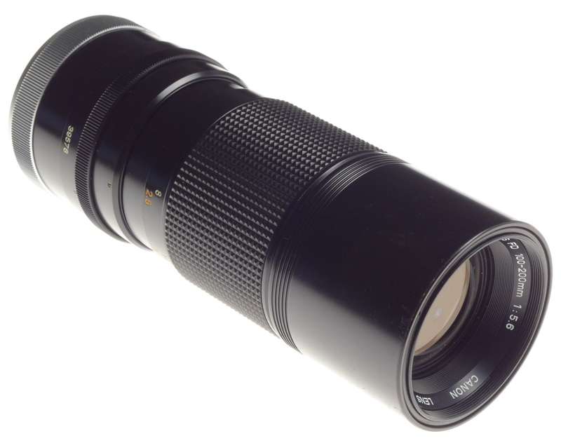CANON Zoom Lens FD 100-200mm 1:5.6 for 35mm SLR vintage classic film camera cap and case