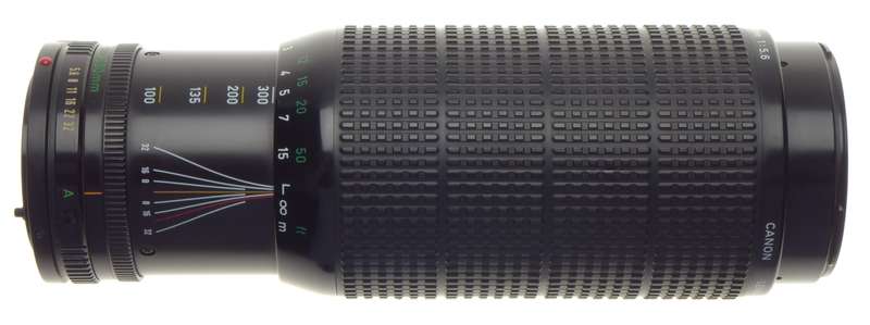 Canon FD 100-300mm Macro Zoom lens 1:5.6 in MINT condition with perfect glass caps included