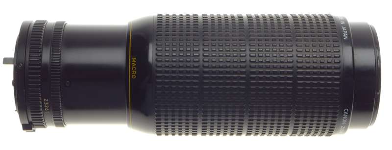 Canon FD 100-300mm Macro Zoom lens 1:5.6 in MINT condition with perfect glass caps included