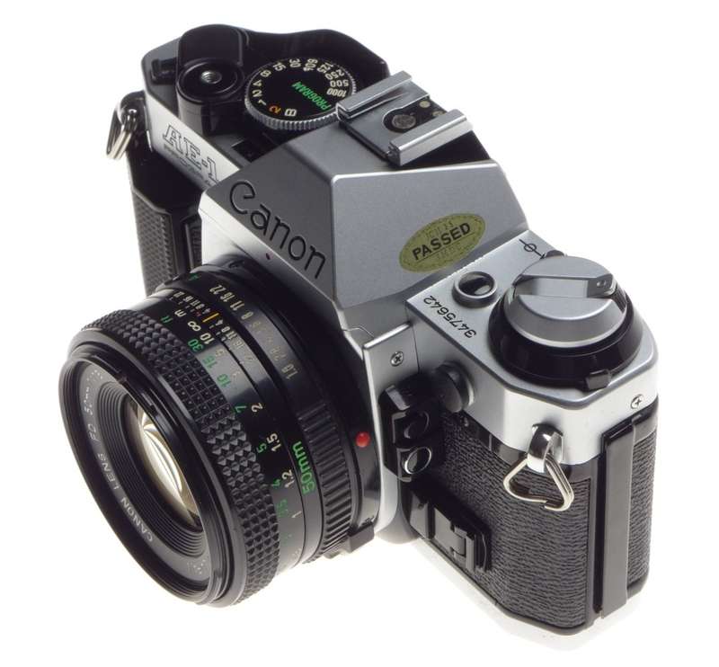 CANON AE-1 PROGRAM chrome 35mm SLR film camera with FD 50 1:1.8 lens with cap - Canon