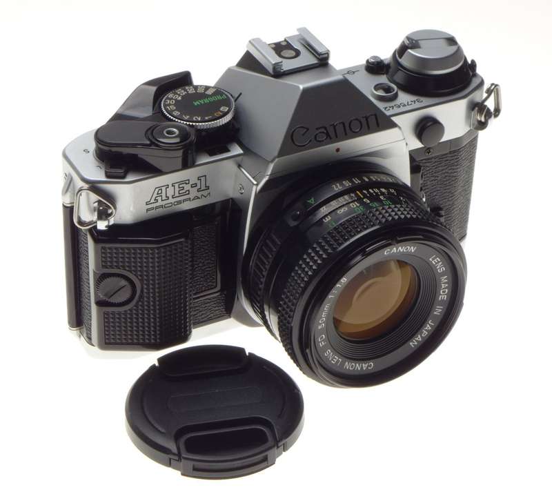 CANON AE-1 PROGRAM chrome 35mm SLR film camera with FD 50 1:1.8 lens with cap - Canon