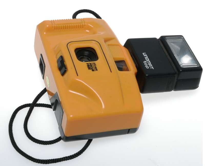 Yellow 35mm point and shoot focus free vintage film camera with flash