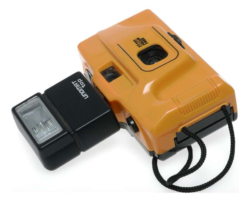 Yellow 35mm point and shoot focus free vintage film camera with flash
