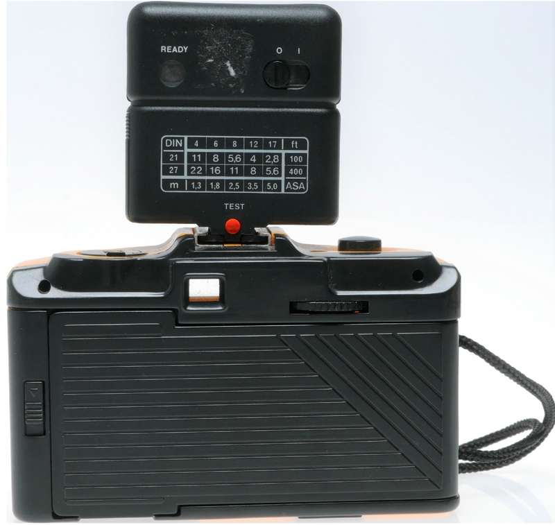 Yellow 35mm point and shoot focus free vintage film camera with flash